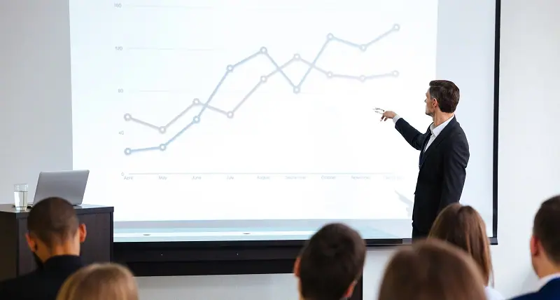 Business conference using a lamp projector